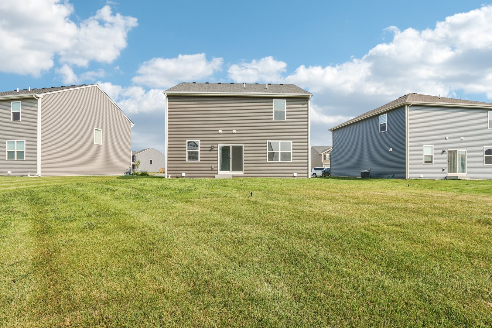 1552 Aspen Lane Pingree Grove, IL 60140 - Photo 39 of 73 a front view of a house with yard and trees