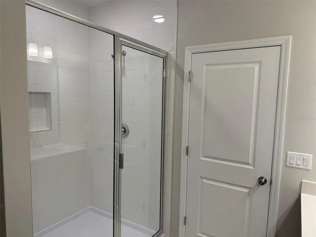 a view of a room with racks on the wall