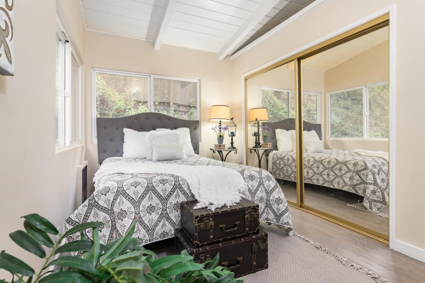 665 Cathedral Drive Aptos, CA 95003 - Photo 15 of 23 a bedroom with a bed and a window