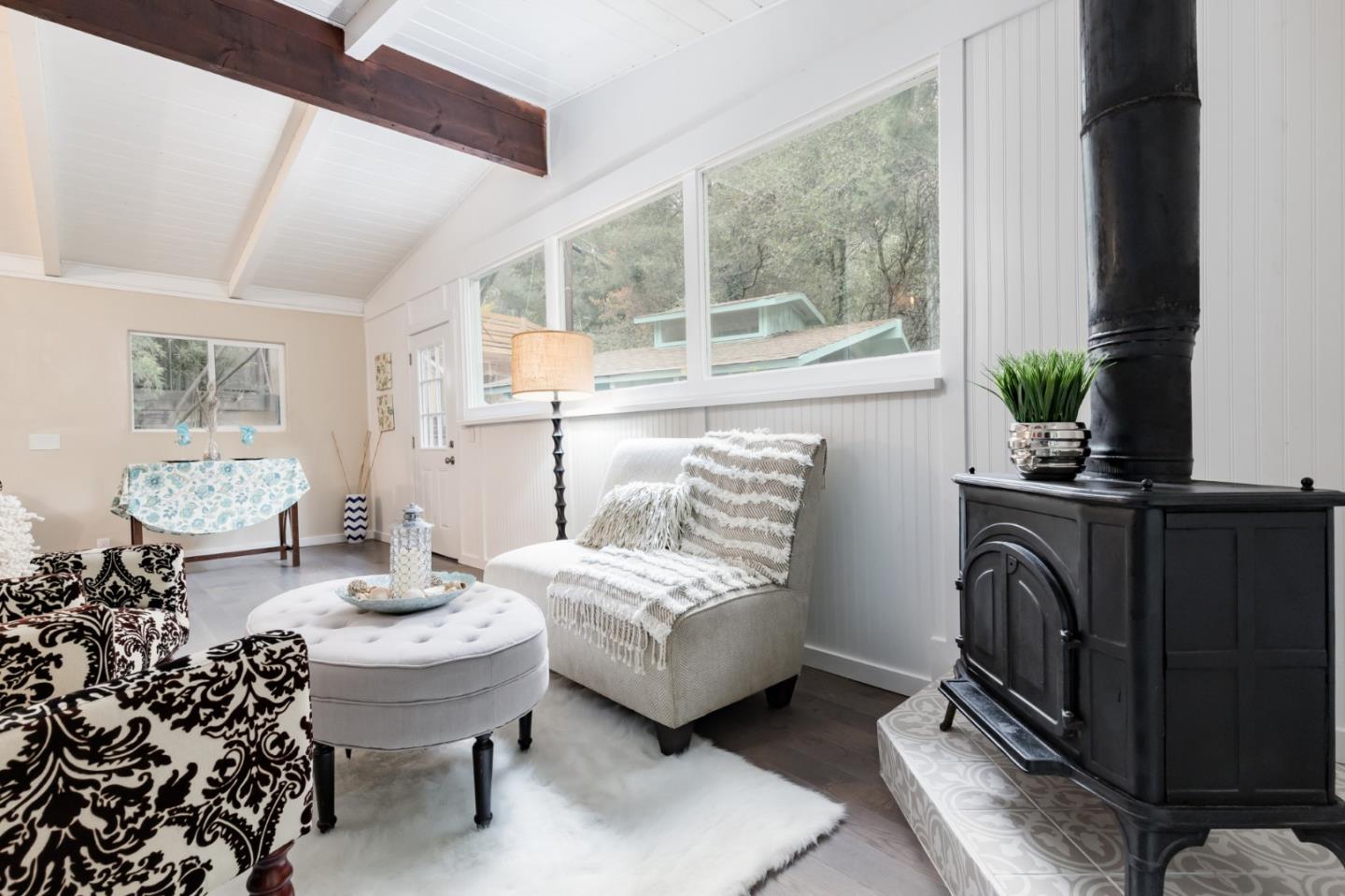 665 Cathedral Drive Aptos, CA 95003 - Photo 16 of 23 a living room with furniture and a fireplace