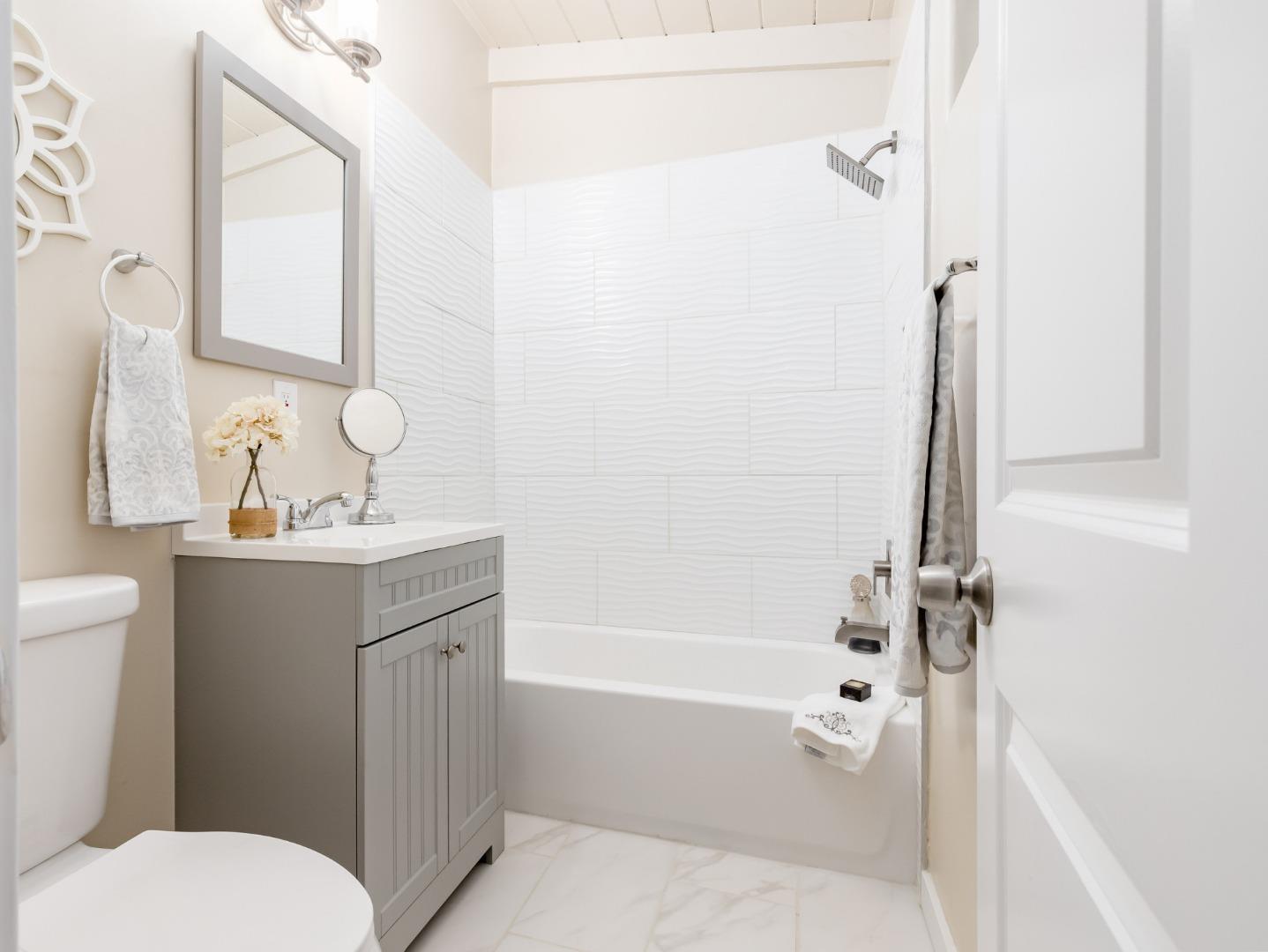 665 Cathedral Drive Aptos, CA 95003 - Photo 7 of 23 a bathroom with a sink a toilet and shower