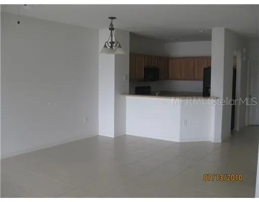 a view of a kitchen with a sink