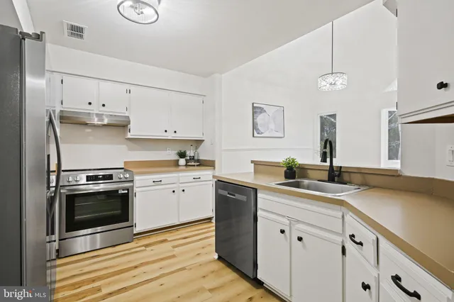 $315,000 | 5002 Dorsey Hall Drive, Unit C5, Ellicott City, MD 21042