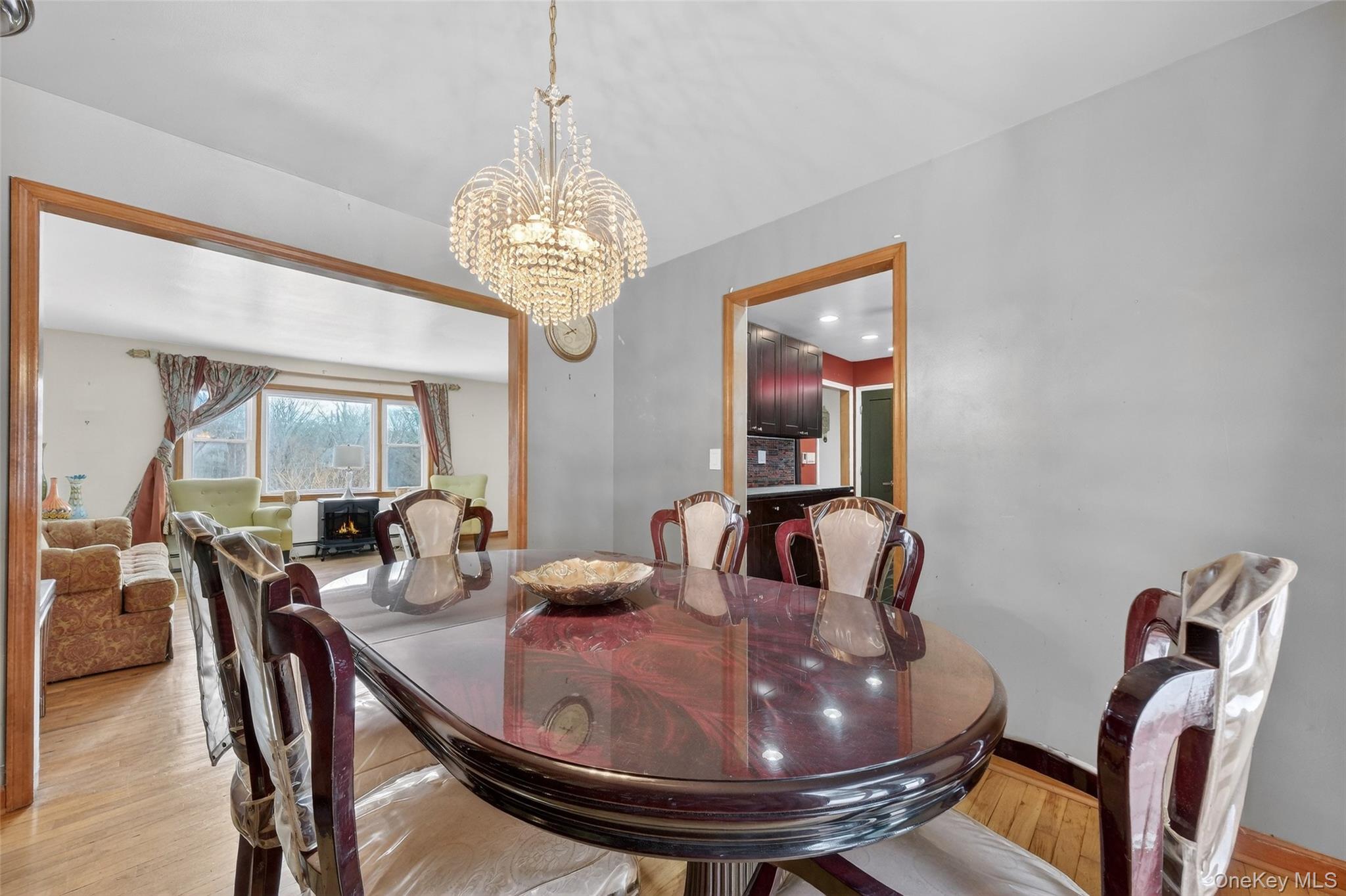 93 Old Mill Road Wallkill, NY 12589 - Photo 11 of 39 Dining space featuring a chandelier and wood finished floors