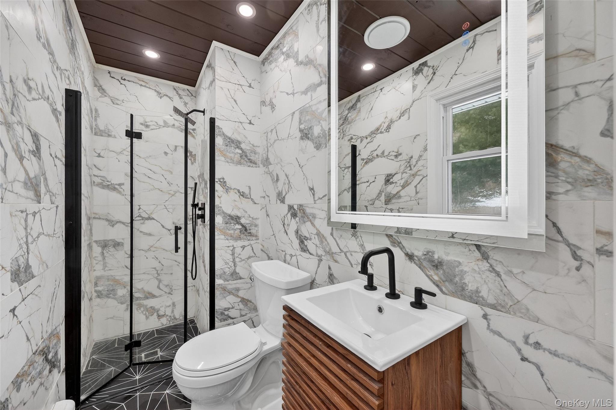 93 Old Mill Road Wallkill, NY 12589 - Photo 19 of 39 Bathroom featuring recessed lighting, tile walls, vanity, a marble finish shower, and wooden ceiling