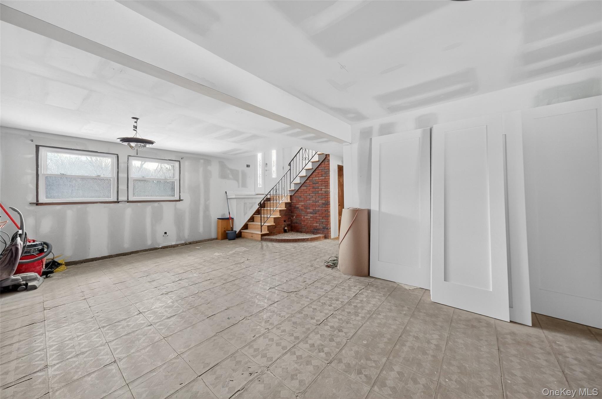 93 Old Mill Road Wallkill, NY 12589 - Photo 27 of 39 Basement with stairway and light floors