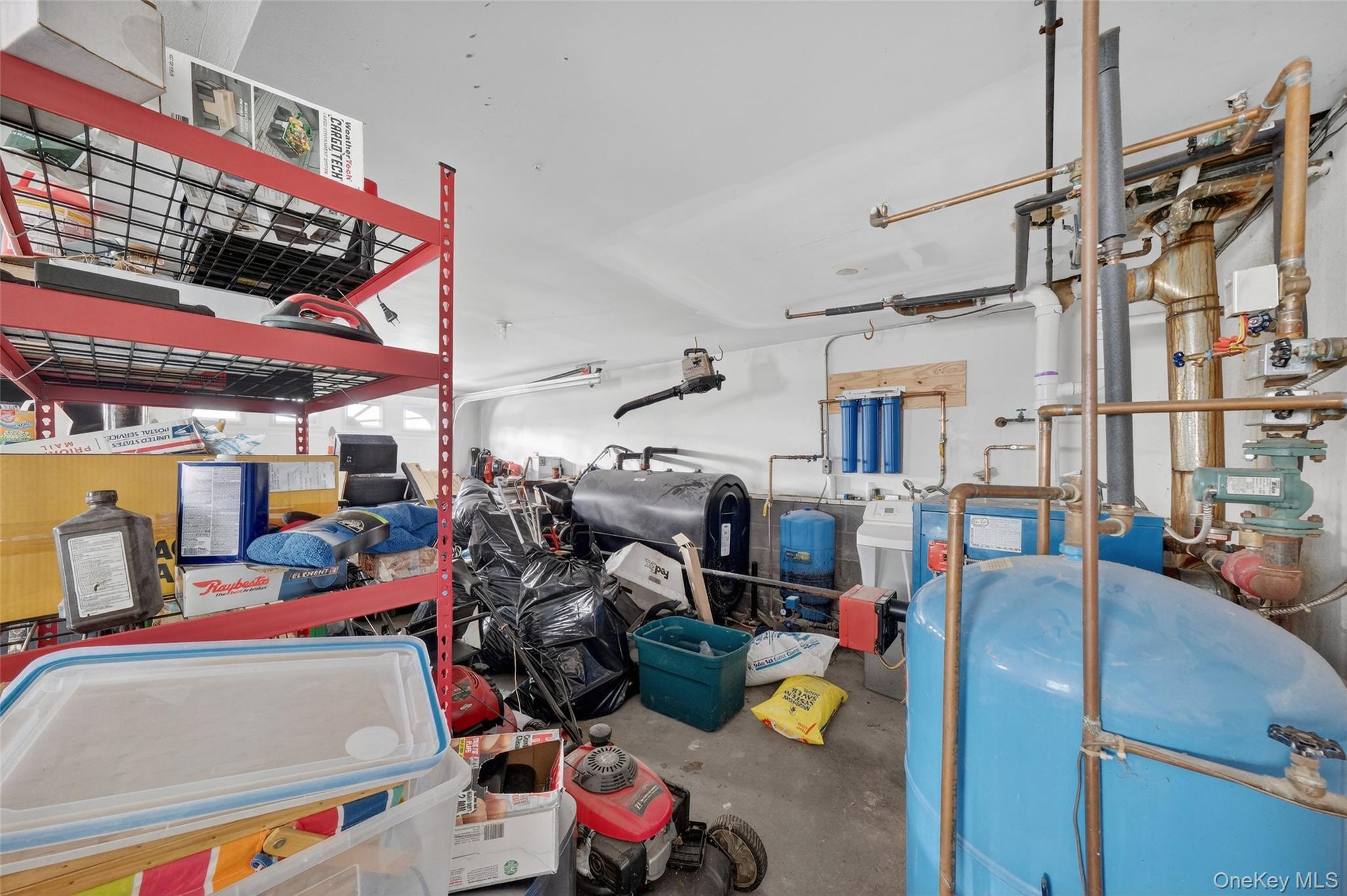 93 Old Mill Road Wallkill, NY 12589 - Photo 33 of 39 Garage featuring oil tank and a heating unit