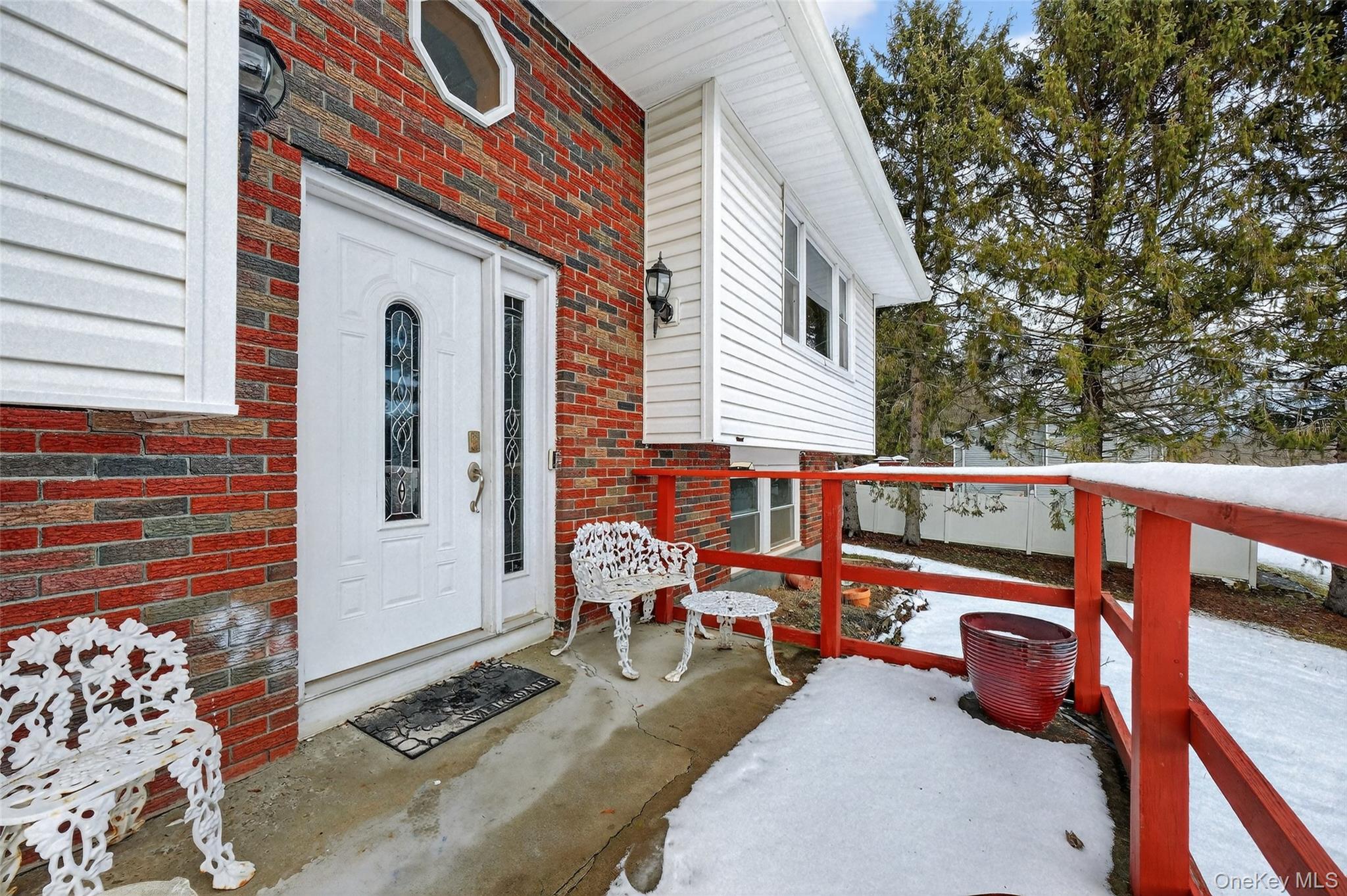 93 Old Mill Road Wallkill, NY 12589 - Photo 4 of 39 View of exterior entry featuring brick siding