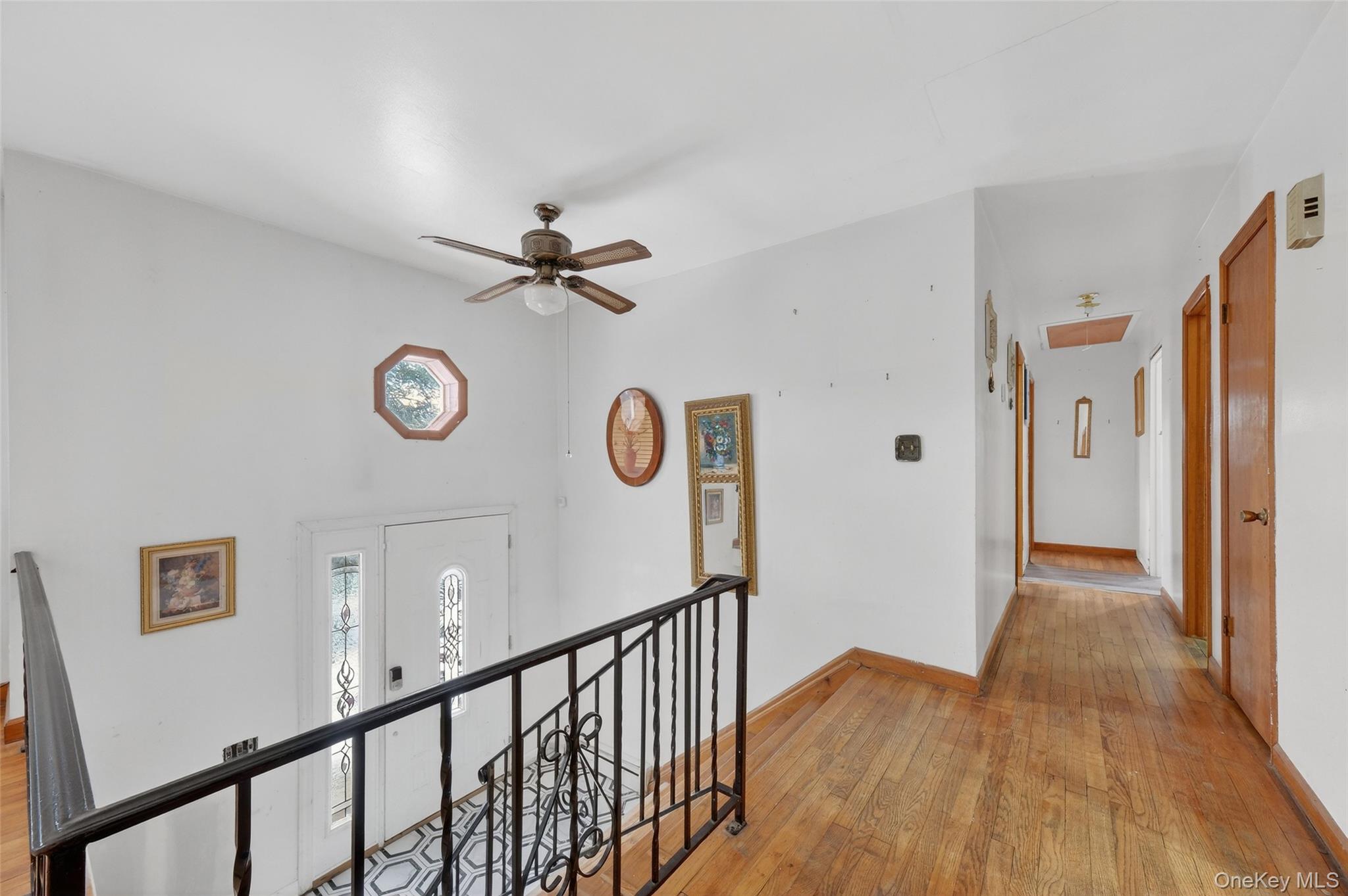 93 Old Mill Road Wallkill, NY 12589 - Photo 6 of 39 Corridor with an upstairs landing and light wood-type flooring