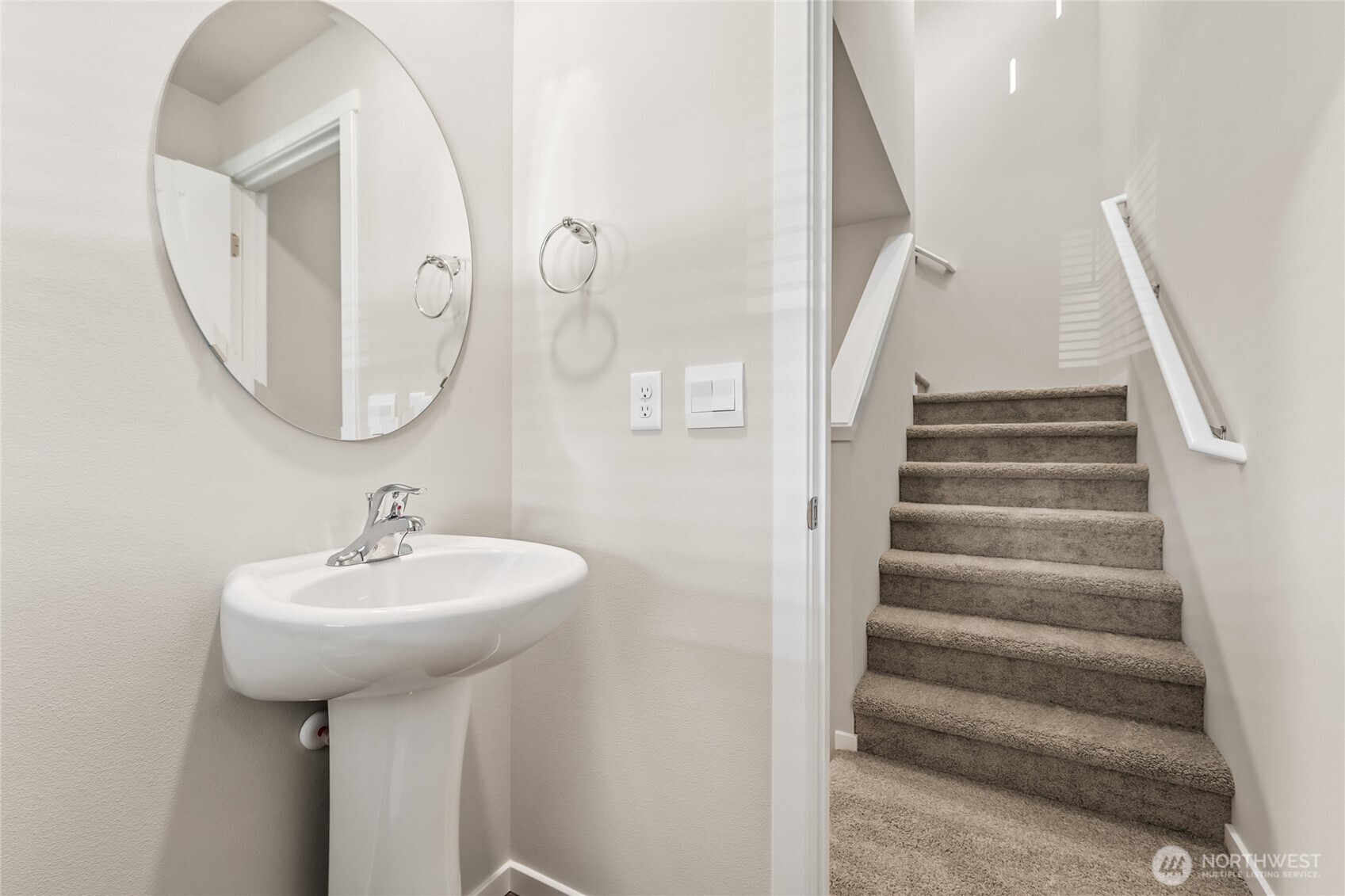 5801 Ivanoff Lane Southwest, Unit 68 Port Orchard, WA 98367 - Photo 11 of 25 a bathroom with a sink and a mirror