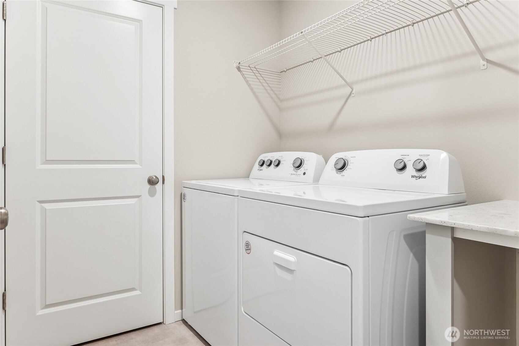 5801 Ivanoff Lane Southwest, Unit 68 Port Orchard, WA 98367 - Photo 16 of 25 a utility room with dryer and washer