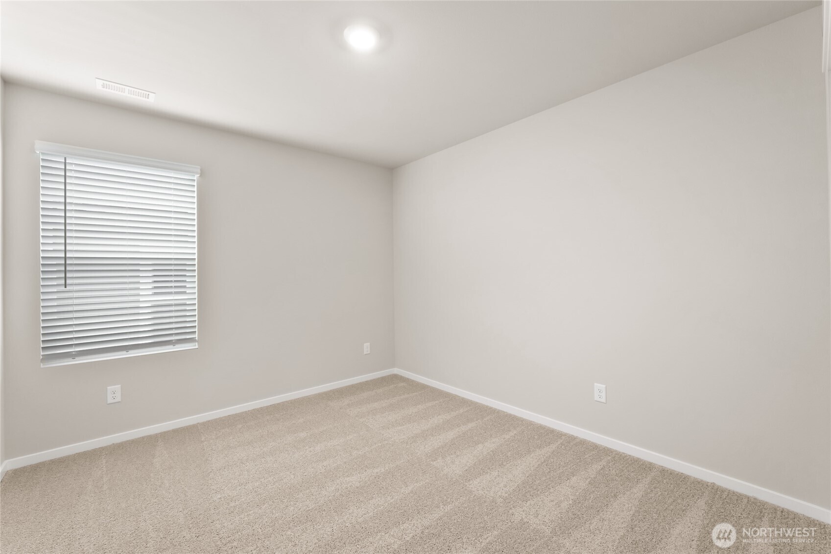 5801 Ivanoff Lane Southwest, Unit 68 Port Orchard, WA 98367 - Photo 18 of 25 an empty room with a window