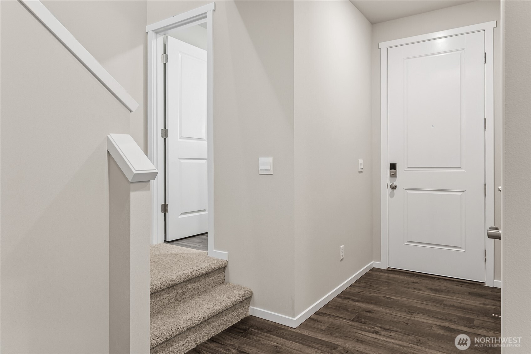 5801 Ivanoff Lane Southwest, Unit 68 Port Orchard, WA 98367 - Photo 2 of 25 a view of entryway and hall with wooden floor