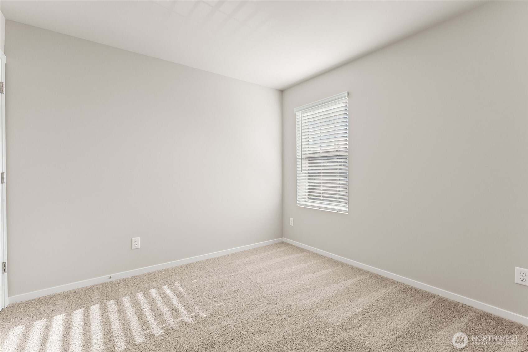 5801 Ivanoff Lane Southwest, Unit 68 Port Orchard, WA 98367 - Photo 21 of 25 a view of an empty room with a window