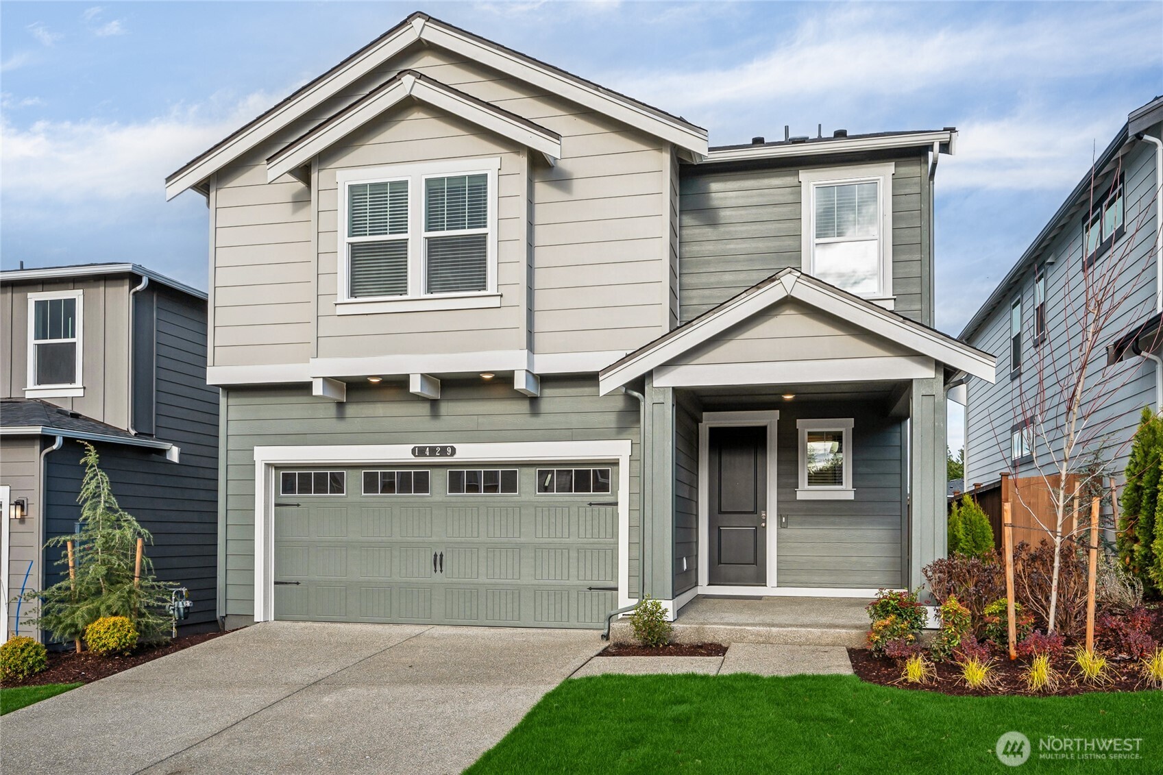 5801 Ivanoff Lane Southwest, Unit 68 Port Orchard, WA 98367 - Photo 24 of 25 a front view of a house with garden