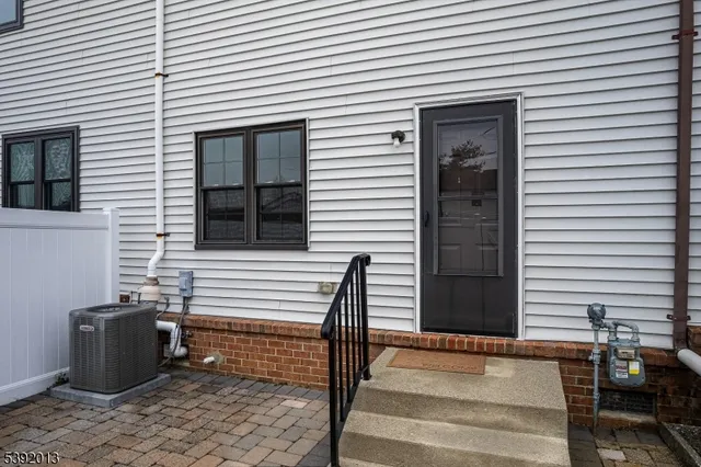 a close view of a brick building with many windows