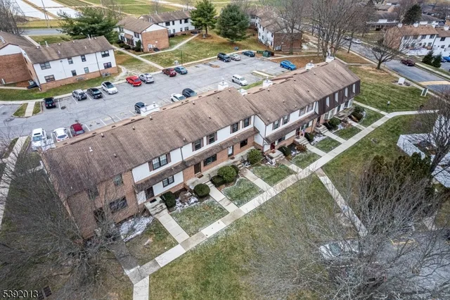 a view of a chairs and table in a patio