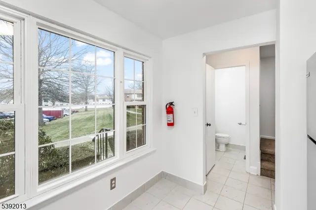 a view of utility room and windows