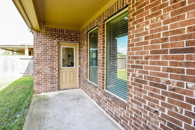 a view of a house with a garden