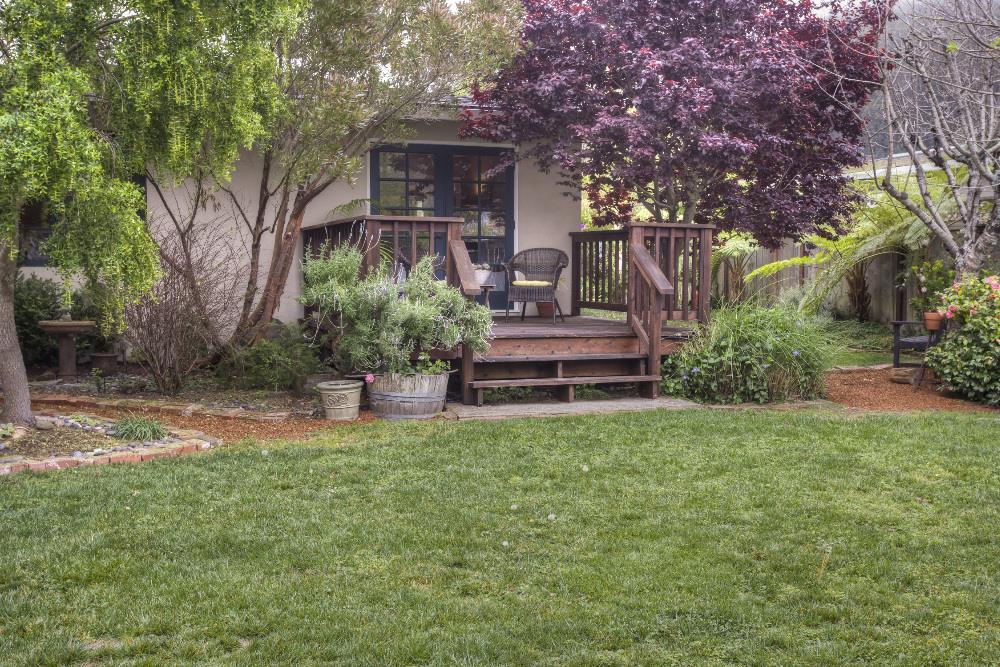 1452 Adobe Drive Pacifica, CA 94044 - Photo 22 of 23 a front view of a house with a yard