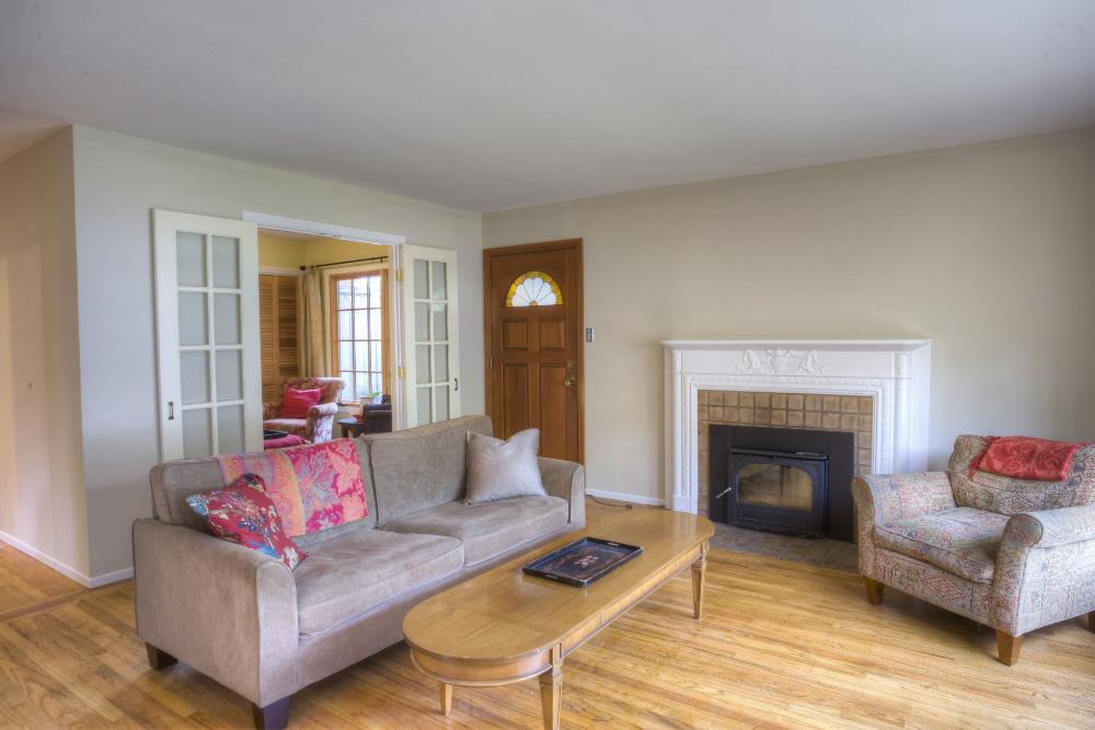 1452 Adobe Drive Pacifica, CA 94044 - Photo 6 of 23 a living room with furniture and a fireplace