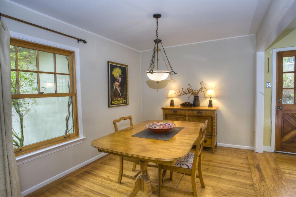 1452 Adobe Drive Pacifica, CA 94044 - Photo 7 of 23 a view of a dining room with furniture window and wooden floor