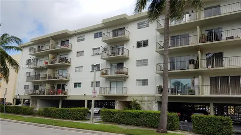 a front view of residential houses with street