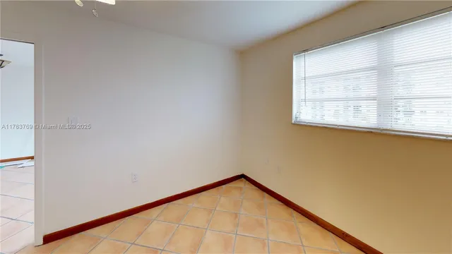 a view of a hallway with a large window