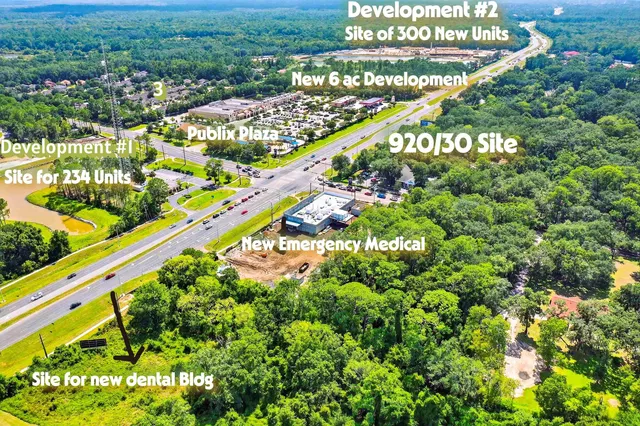 a picture of a book and a white bed