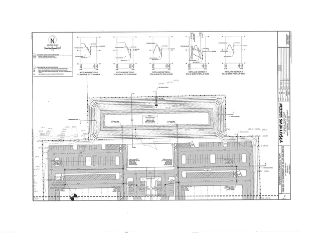 a view of swimming pool with a yard and plants