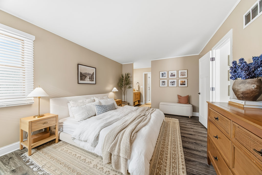 752 North Brookdale Drive Schaumburg, IL 60169 - Photo 11 of 23 a bedroom with a bed and a couch