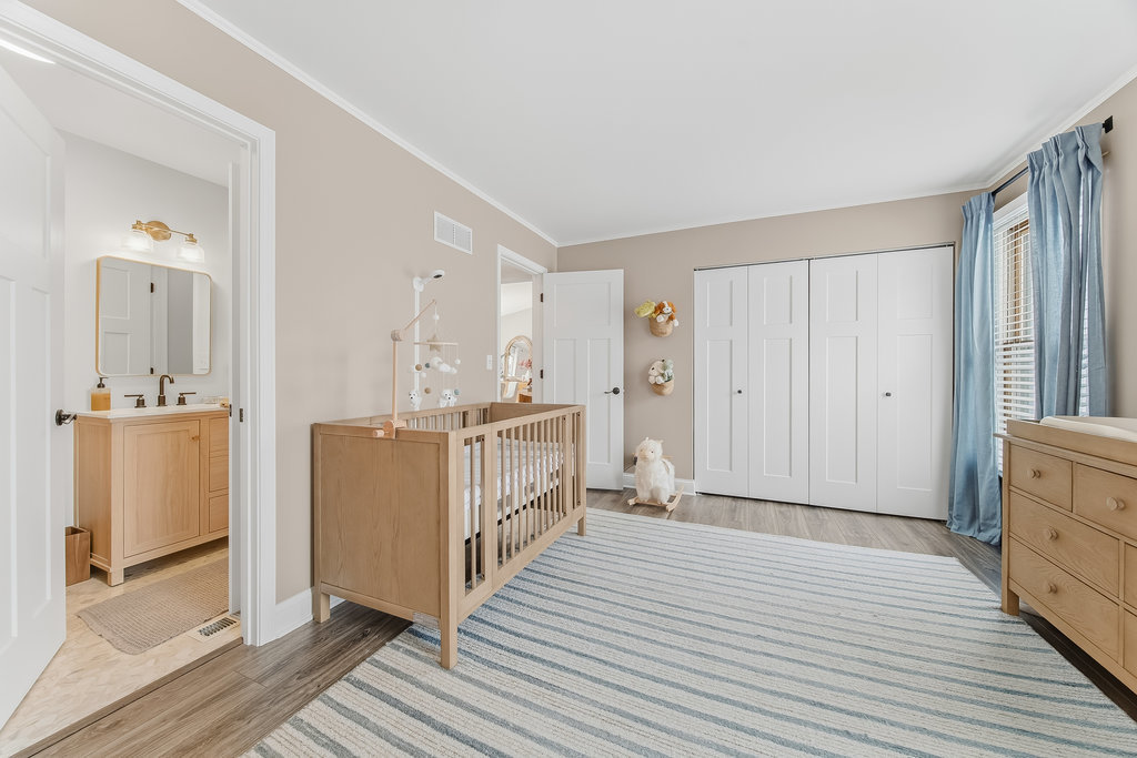 752 North Brookdale Drive Schaumburg, IL 60169 - Photo 15 of 23 a view of a hallway with wooden floor and staircase