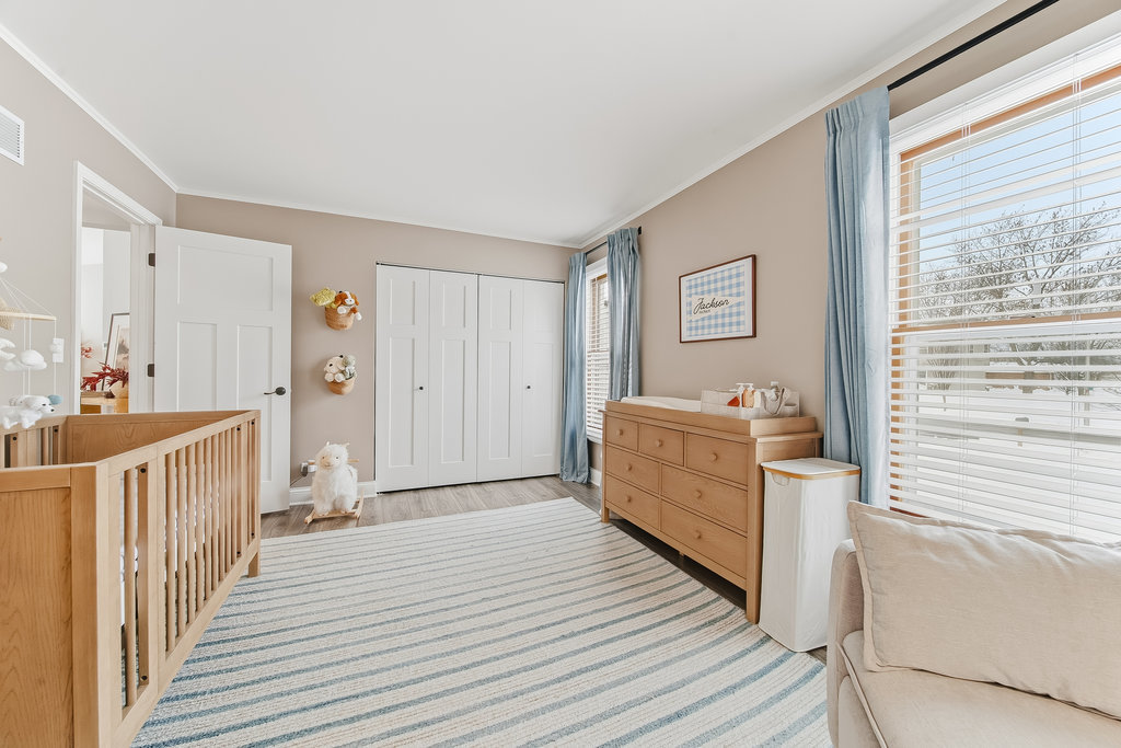 752 North Brookdale Drive Schaumburg, IL 60169 - Photo 16 of 23 a view of a hallway to a livingroom and a couch