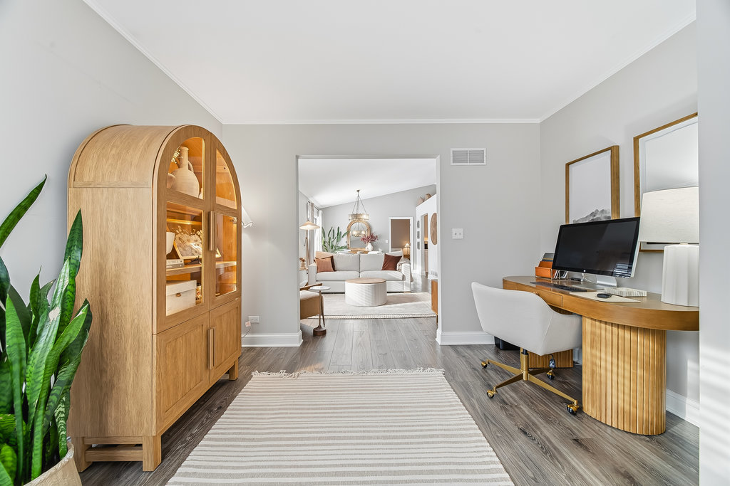 752 North Brookdale Drive Schaumburg, IL 60169 - Photo 17 of 23 a view of a livingroom with furniture and a flat screen tv