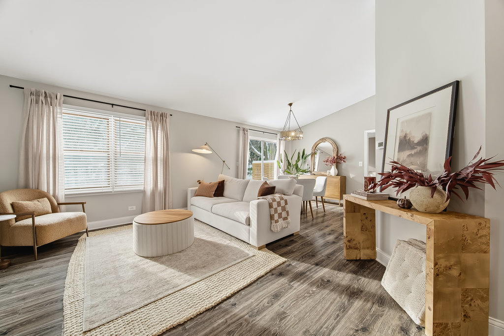 752 North Brookdale Drive Schaumburg, IL 60169 - Photo 4 of 23 a living room with furniture and a large window