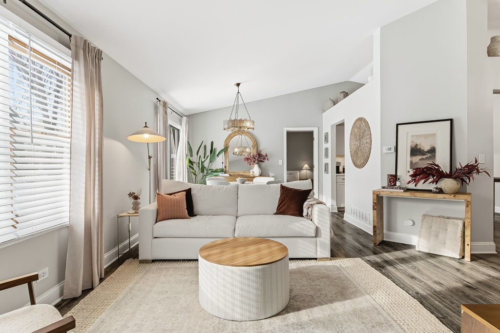 752 North Brookdale Drive Schaumburg, IL 60169 - Photo 5 of 23 a living room with furniture and a chandelier