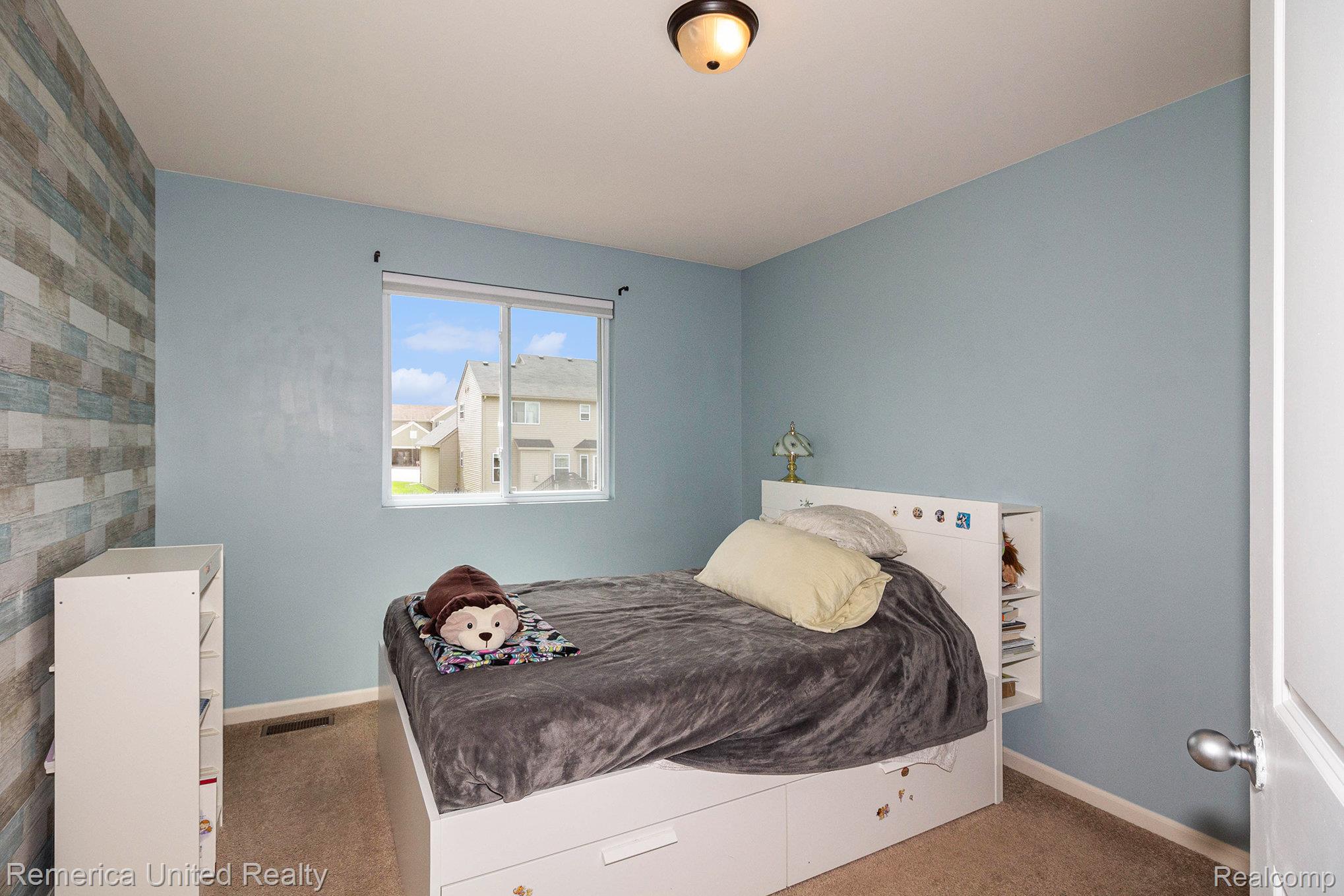 4142 Chase Ridge Lane Howell, MI 48843 - Photo 13 of 21 Bedroom with baseboards and carpet