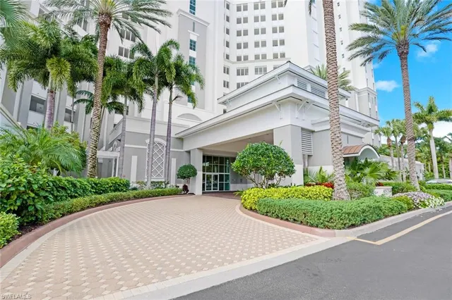 a view of a garden with a palm trees