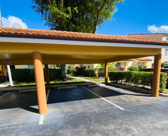 a view of swimming pool with outdoor seating