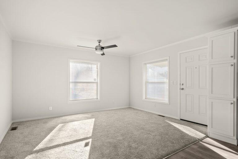 6850 Downing Road, Unit SPC 11 Central Point, OR 97502 - Photo 2 of 18 an empty room with windows and closet