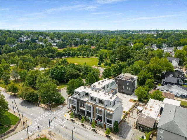 an aerial view of a house with a ocean view