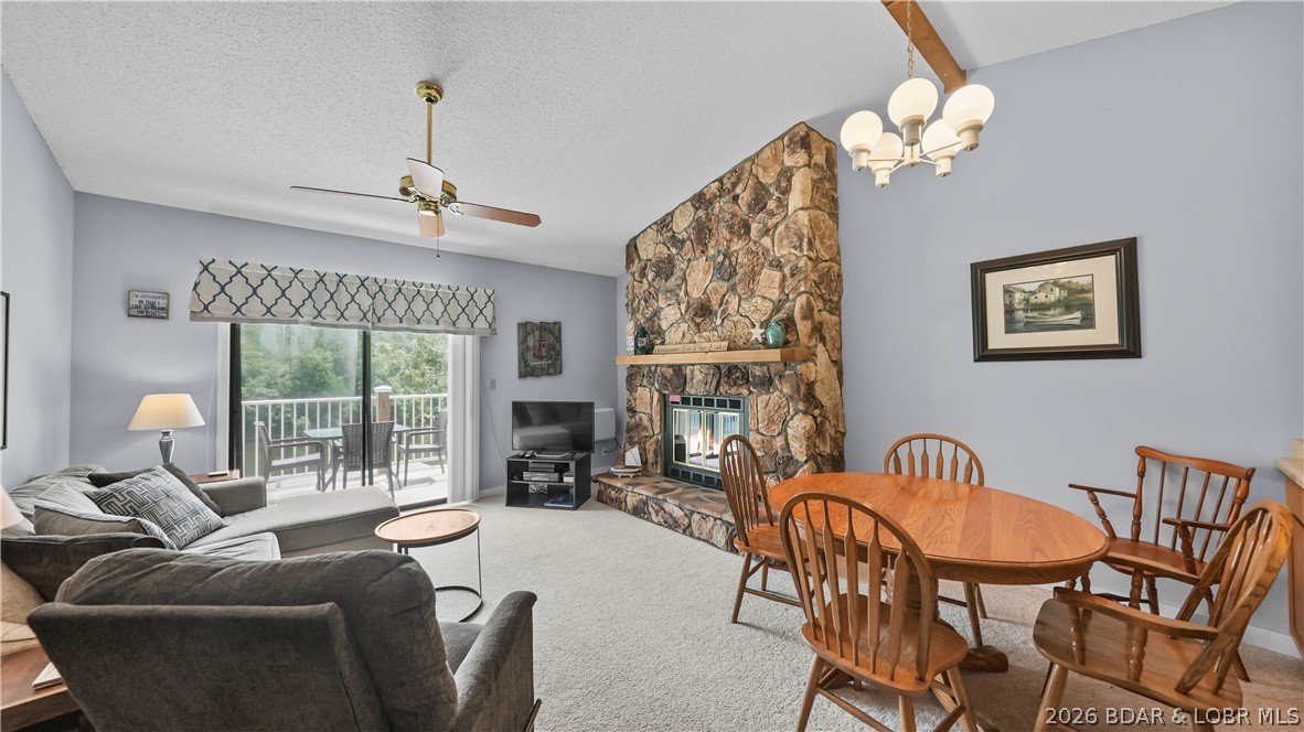 611 Lazy Days Road, Unit B11 Osage Beach, MO 65065 - Photo 4 of 40 Living Room with Fireplace