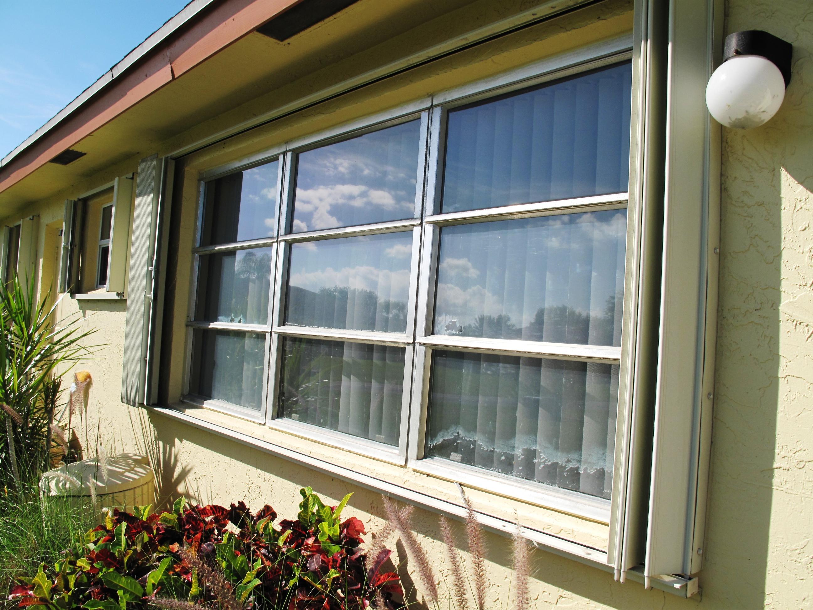 14215 Nesting Way, Unit C Delray Beach, FL 33484 - Photo 4 of 50 Accordion shutters