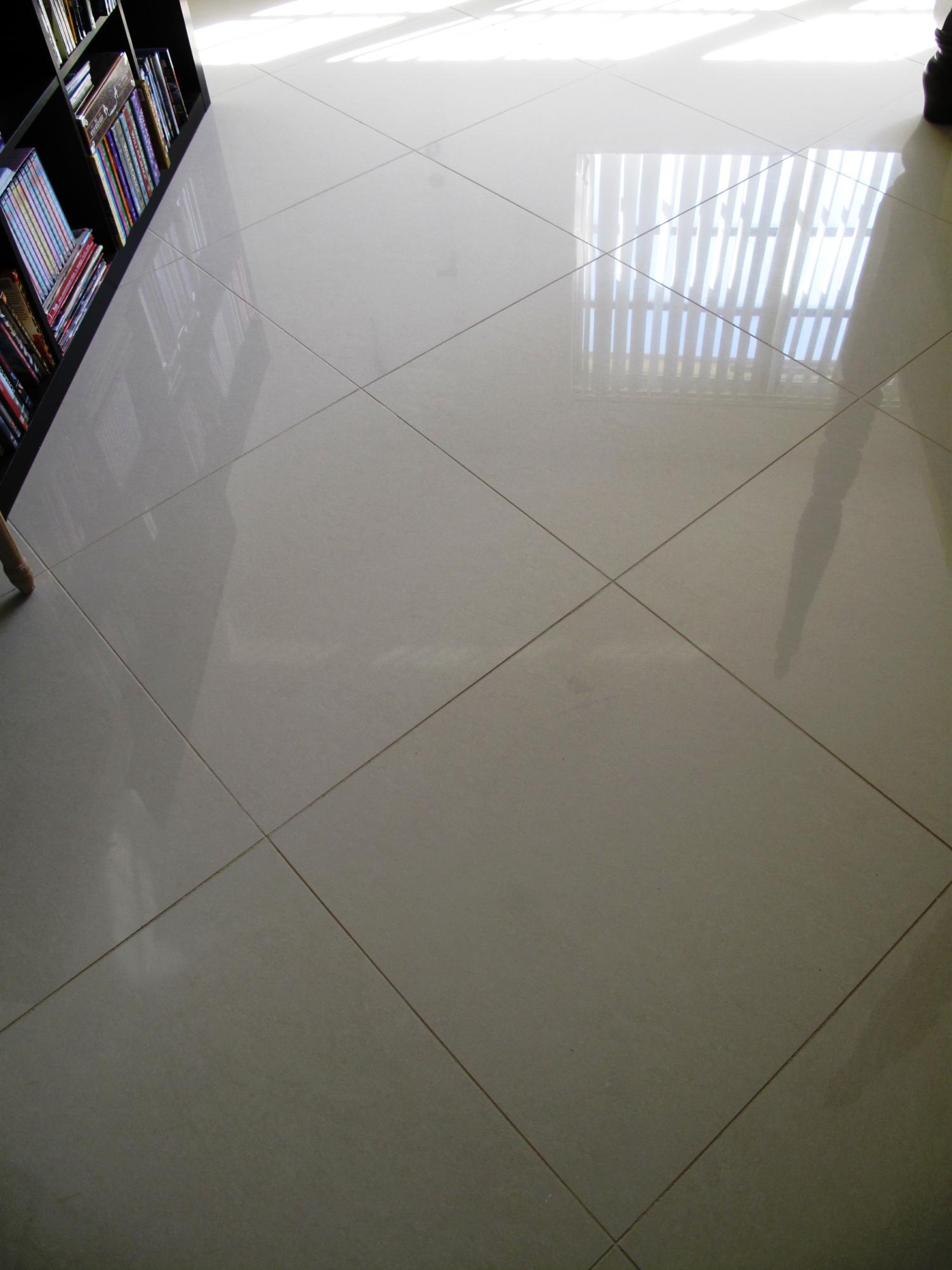 14215 Nesting Way, Unit C Delray Beach, FL 33484 - Photo 8 of 50 24x24 white tile throughout