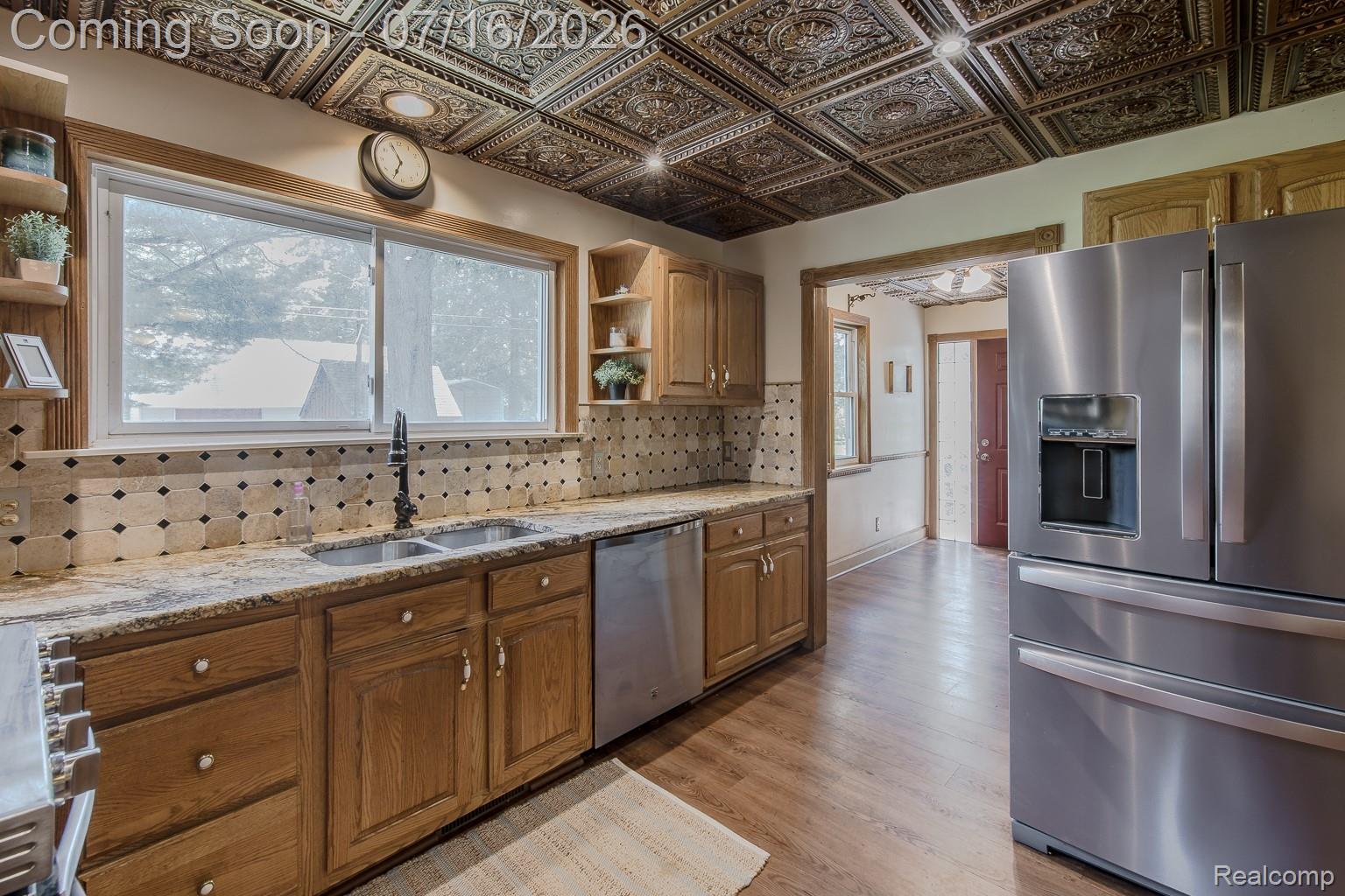 43995 Bemis Road Belleville, MI 48111 - Photo 14 of 67 Large window and stainless steel appliances