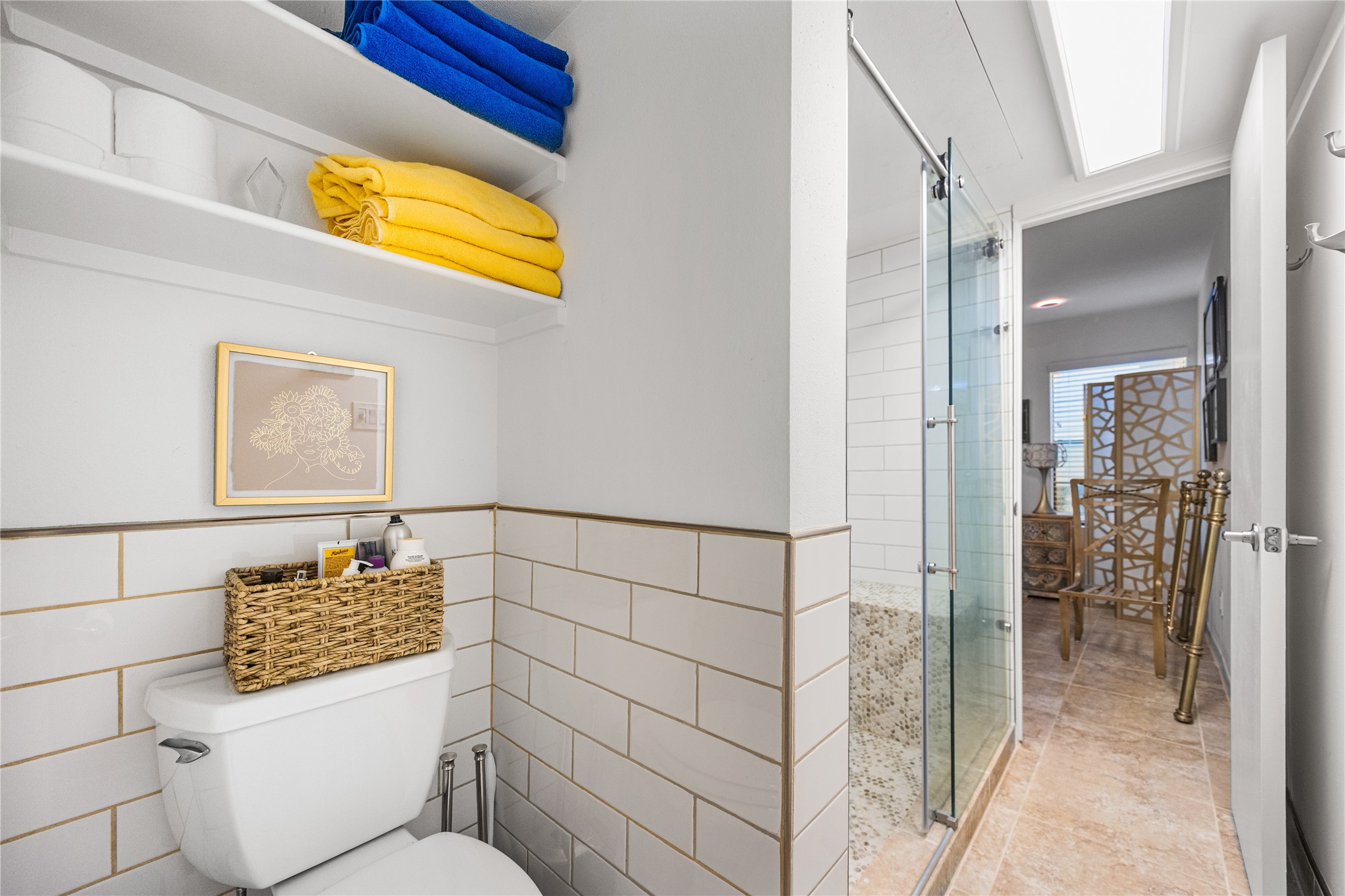 12900 Walden Road, Unit 1009J Montgomery, TX 77356 - Photo 17 of 24 a bathroom with a toilet and a shower