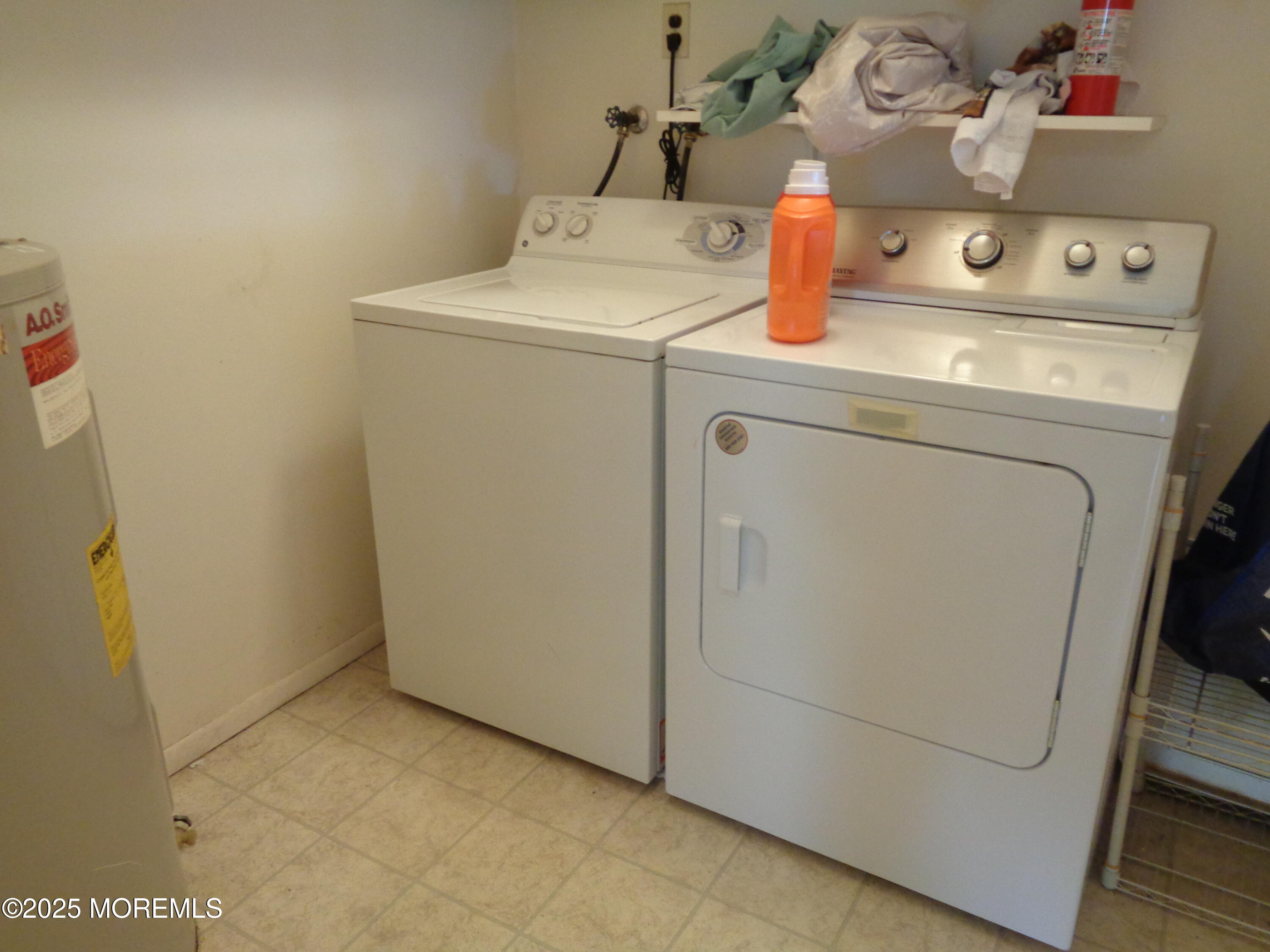 22 A Homestead Drive Whiting, NJ 08759 - Photo 14 of 15 a utility room with dryer and washer