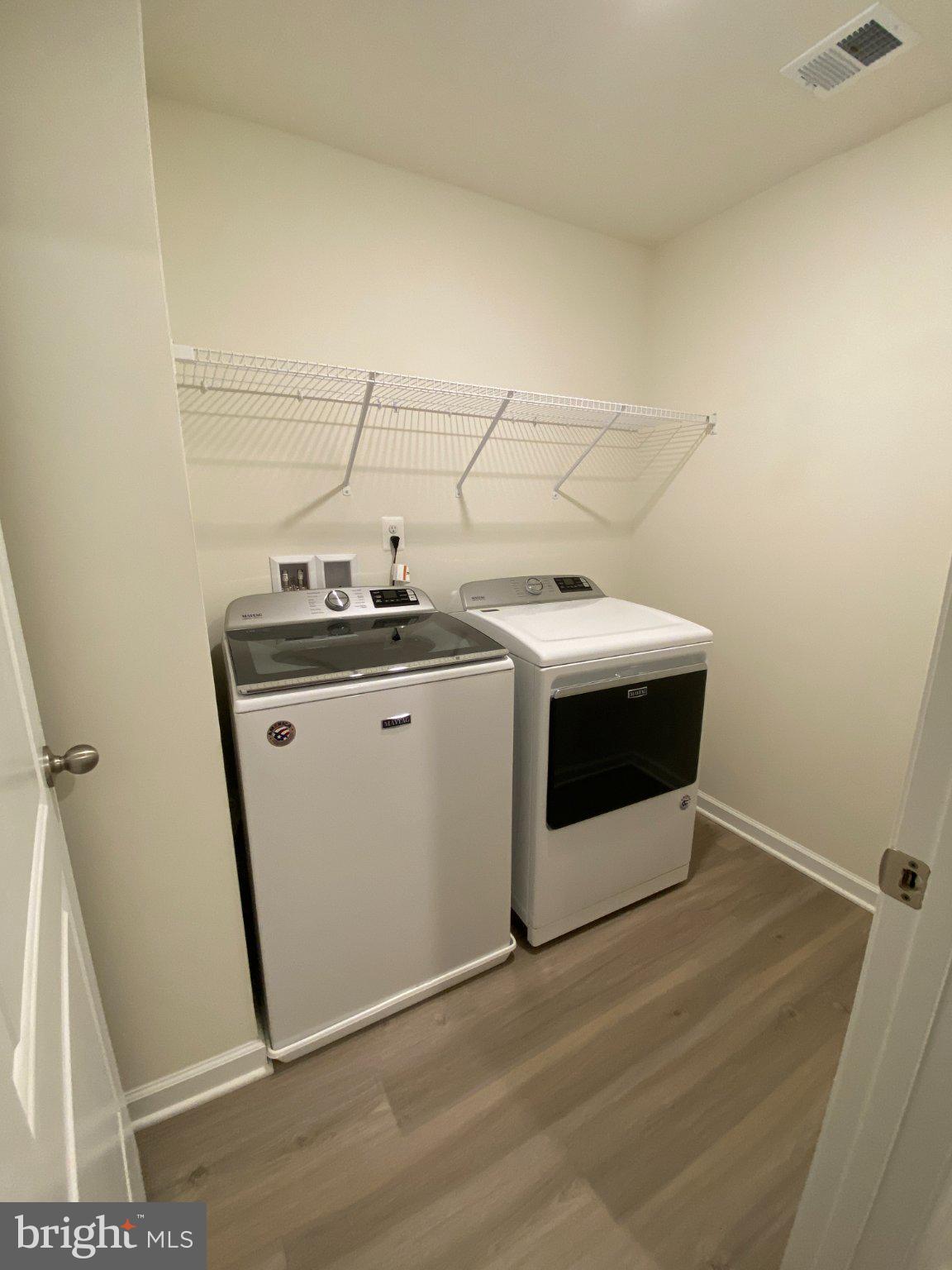 697 Rivanna Run Falling Waters, WV 25419 - Photo 31 of 44 a utility room with sink dryer and washer