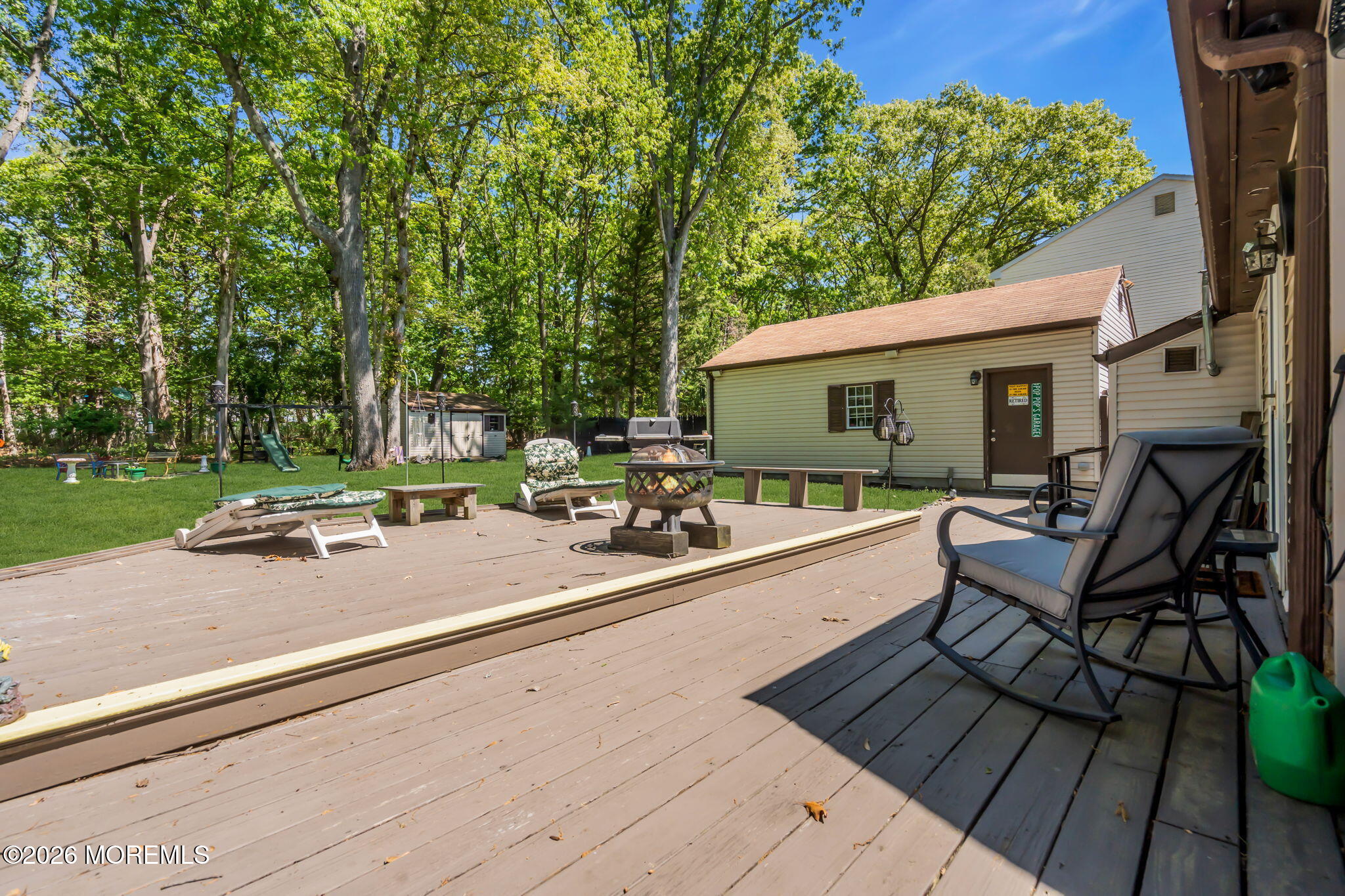 437 Shady Lane Howell, NJ 07731 - Photo 17 of 21 a view of a patio with chairs and a table with chairs
