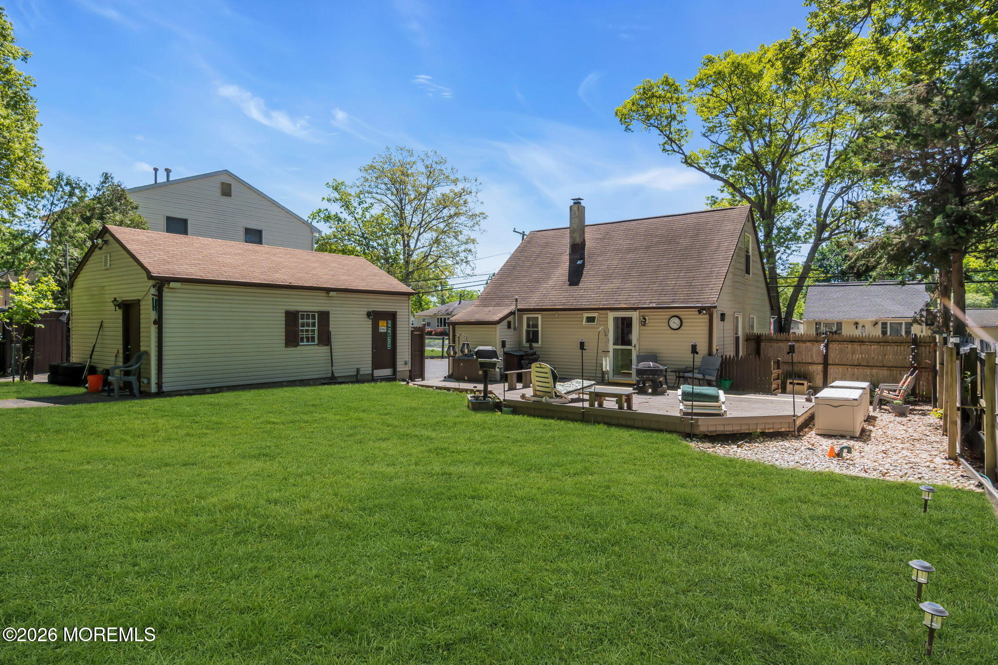 437 Shady Lane Howell, NJ 07731 - Photo 18 of 21 a view of a house with backyard and sitting area